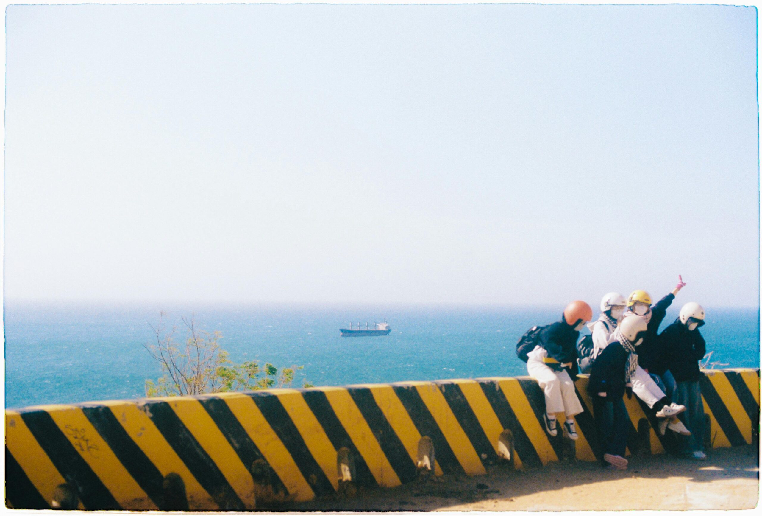 Group of friends enjoying a sunny day by the ocean in Ninh Thuận, Vietnam.